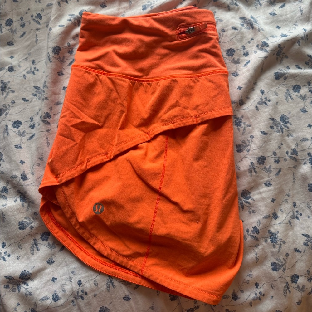 Bright orange Lulu high waisted shorts!